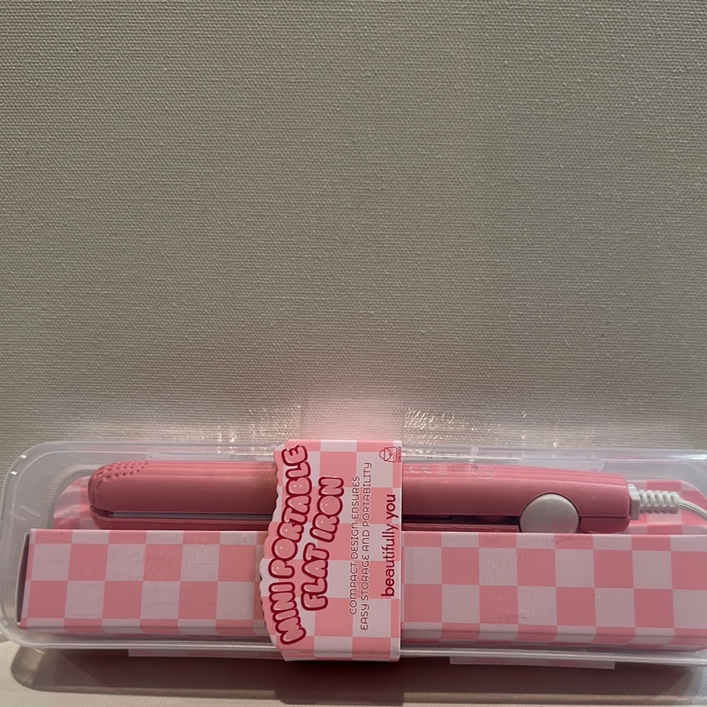 Beautifully You Mini Straightener Travel Flat Iron with Ceramic plates.